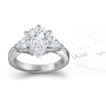 Three Stone Pears Diamond & Side Heart Diamonds Three Stone Anniversary Ring