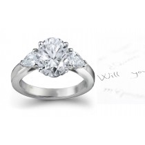 Center Oval & Side Pears Diamonds Three Stone Ring