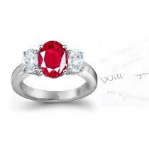 Three Stone Ruby and Diamond Ring: Three Stone (Three Oval Ruby and Diamonds) Rings in Platinum. 