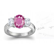 The Maggiore Collection: 3 Stone Ladies Pink Oval Sapphire & Oval White Diamonds Ring