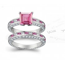 A timeless, design with a deep pink 1.0 carat Splendid Sapphire & halo of well-cut White Diamonds sapphire in Platinum