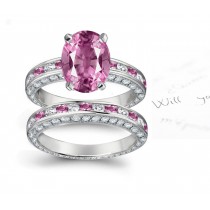 A timeless, design with a deep pink 1.0 carat Splendid Sapphire & halo of well-cut White Diamonds sapphires