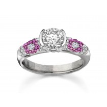 Luxurious and Large White Diamond Ring featuring pave set White Diamonds with pink Tradional Sapphire flowers