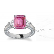 3 Stone Emerald Cut Pink Sapphire & Heart Diamond Ring in Platinum & White gold