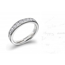 Nine Channel Set Round Diamond Anniversary Rings