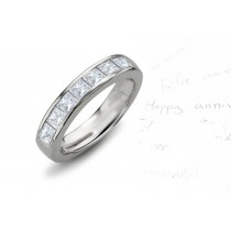 Seven Stone Diamond Ring: Platinum Princess Cut Diamond Seven Stone Channel Set Diamond Anniversary Ring.