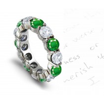 Distinctive Qualities: In Stock Prong Set Brilliant Cut Round Emerald & Diamond Eternity Ring in 1.0 to 5.0 carats