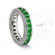 Attention & Admiration: Vintage Engraved Wedding Band Entirely Made of Round Vibrant Green Emeralds in Platinum or Gold