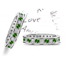 Shining & Gleaming: Prong Channel Set Emerald & Diamond Eternity Band in Gold with Brilliant Green of Olives
