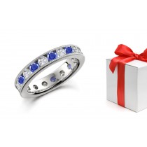 Dancing in the Light: Round Sapphire & Brilliant Diamond Anniversary Band in Platinum Gold
