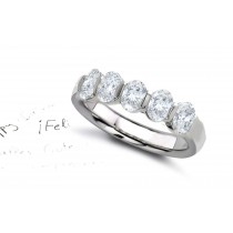 Platinum Prong Set Oval Diamond Half Eternity Ring.