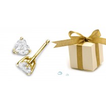 Platinum 14K Yellow Gold Studs with Heart Diamonds.