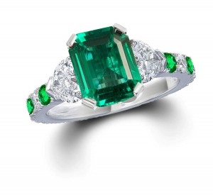 Three Stone Rings With Center Emerald & Further Diamond Accents on Sides