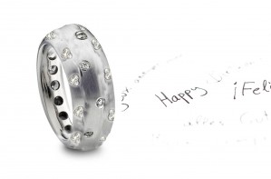 Eternity Band Builder: Brush Finish Platinum Band with Burnish Set Round Diamonds in Center & Heart Diamonds on Sides