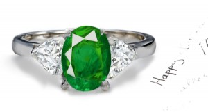 A Special Gift: Center Oval Emerald & Side Matched Heart Brilliant Diamond Three Stone 2 Side Stone Platinum Hoop Ring