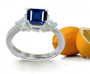 Attractive & Divine: One Top 3 Stone Square Sapphire Guarded By 2 Trillion Cut Diamond Ring