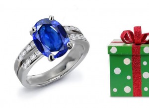 King of Gems: Large Oval Stone Accented By 2 Side Blue Stone Fine Blue Sapphire & Diamond Putnam Anniversary Volume Ring
