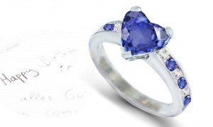 Diamond Sparkles: Popular Heart Shaped Blue Fine Blue Sapphire atop Sapphires & Diamonds Accents Ring