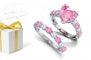 Vivid: Deep Pink Heart Sapphire atop Round Pink Sapphire & Diamond & Platinum Ring & Sapphire Diamond Band