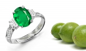 3 Stone Ring with Center Oval Emerald & Brilliant Round Diamonds side stones