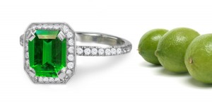 This Gold & Long Lines of Emerald Cut Emerald & Round Diamond Halo Emit Radiance Brilliantly