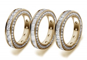 Princess Cut Diamond Eternity Band in Gold with Halo Diamondon Sides in Platinum & Gold