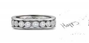 Craftsmanship: A Center Row of Strong Bezel Set Diamonds Sandwiched in Between Platinum Bands