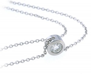 Platinum diamond pendants. Bezel set round diamond solitaire pendant with chain