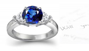 Precious Promises: Stylish Heart Blue Sapphire and Round Diamond Ring. 