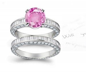 A timeless, design with a deep pink 1.0 carat Popular Sapphire & halo of well-cut White Diamonds Splendid Sapphires