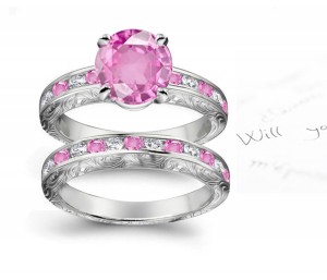 A timeless, design with a deep pink 1.0 carat Splendid Sapphire & halo of well-cut White Diamonds Splendid Sapphires in Ring