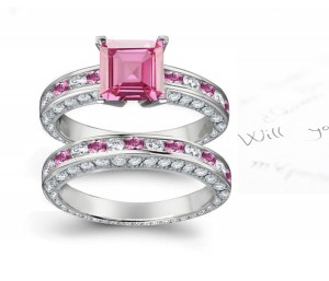 A timeless, design with a deep pink 1.0 carat Splendid Sapphire & halo of well-cut White Diamonds sapphire in Platinum