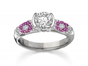 Luxurious and Large White Diamond Ring featuring pave set White Diamonds with pink Tradional Sapphire flowers