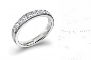 Nine Channel Set Round Diamond Anniversary Rings