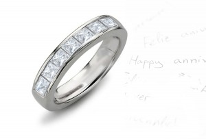 Seven Stone Diamond Ring: Platinum Princess Cut Diamond Seven Stone Channel Set Diamond Anniversary Ring.